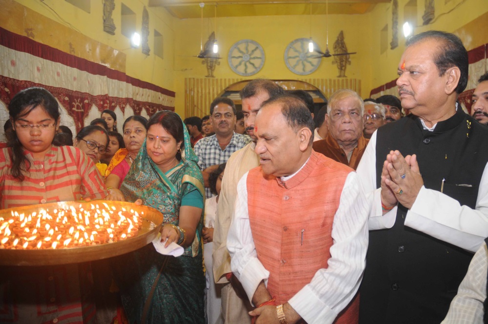 <p>Urban Development Minister CP Singh, former Union Minister Subodh Kant Sahay alonwith Kayastha Parivar devotees performs Aarti during Chitra Gupta puja at Bihar club in Ranchi on…