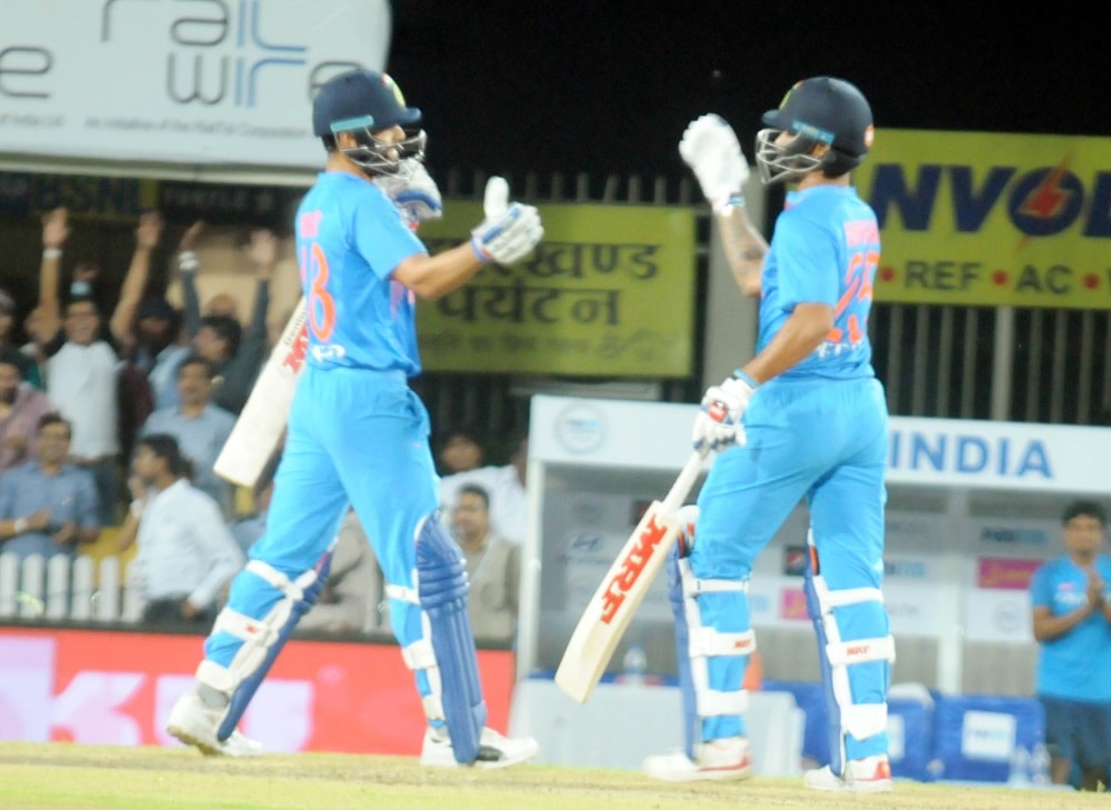 <p>Indian Captain Virat Kohli and Shiker Dhawan greets each other after winning the first T20 match by 9 wickets against Australia at JSCA stadium in Ranchi on Saturday.</p>
