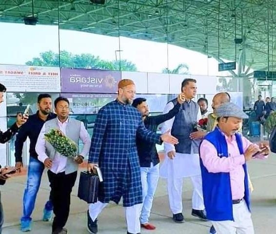 <p>AIMIM President Asaduddin Owaisi arrives to be greeted by his partymen at Birsa Munda Airport in Ranchi on November 27, 2019. He is slated to address an election rally for his party…