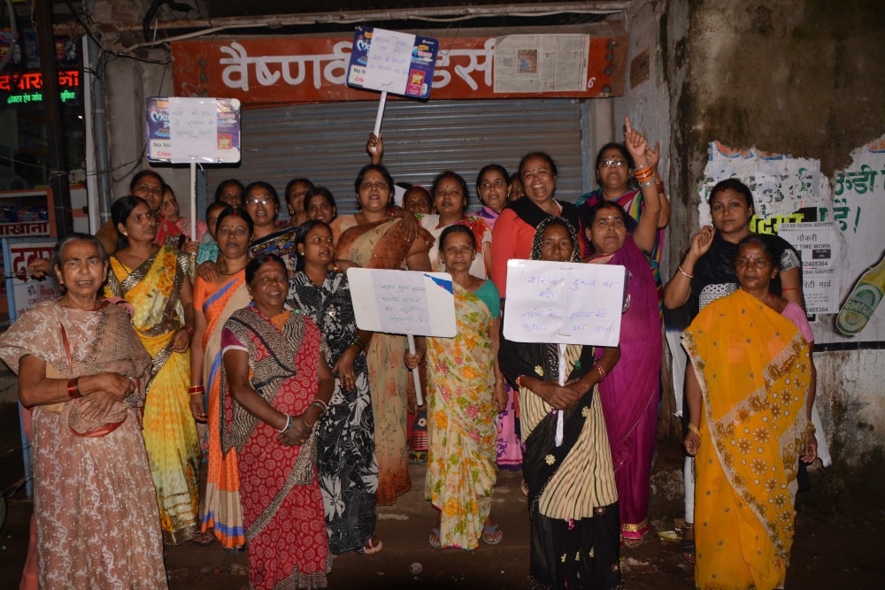 <p>Local residence women protest in front of a liquor shop demanding prohibition on Government run liquor shops in Ranchi on Monday.</p>
