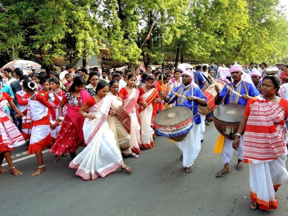 <p>Sarhul celebration in Ranchi where tribal men and women walked, played musical instruments and danced.</p>
