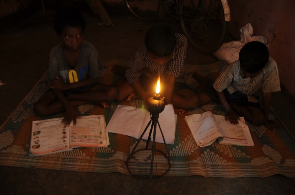<p>Power cut makes students study under 'Diya' light inside a hostel in Ranchi,a feature common to lakhs of students in Jhakhand where BJP Govt led by Chief Minister Raghubar…