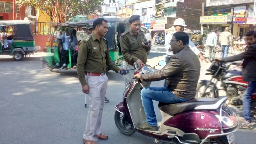 <p>Traffic SP, Dilip Khalko during a campaign against motor cyclists without helmet in Ranchi on Tuesday.</p>
