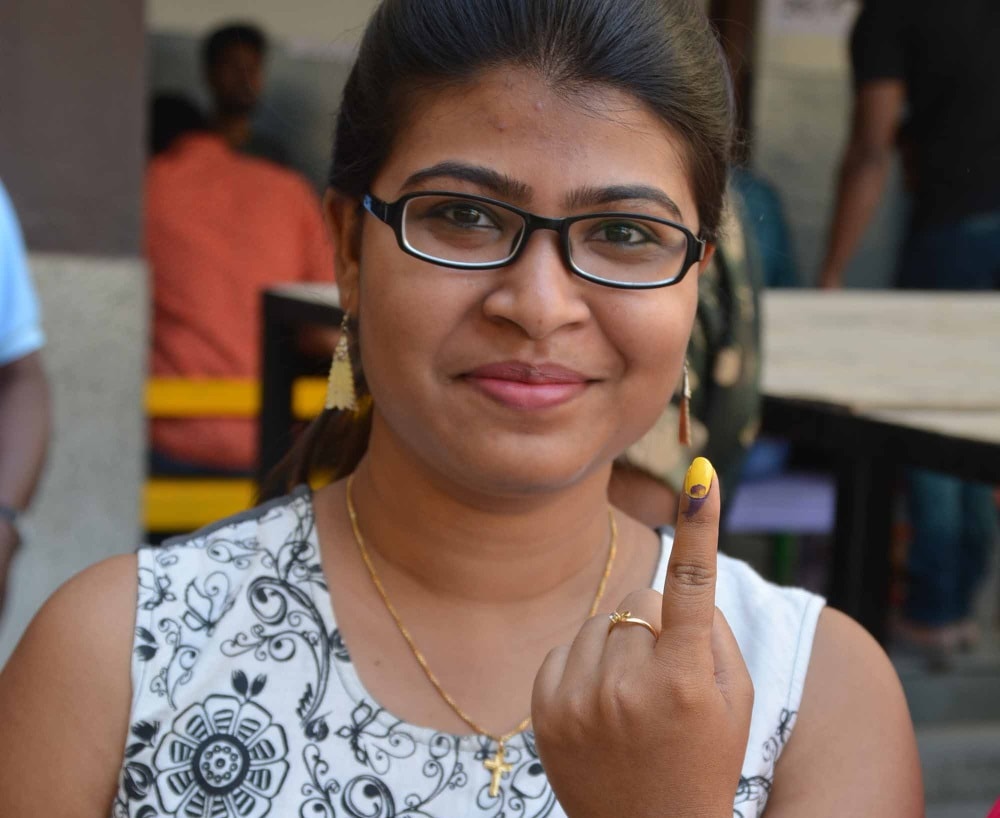 <p>A first-time voter showing her finger after casting her vote at a polling station during civic body elections at Ranchi on Monday. </p>
