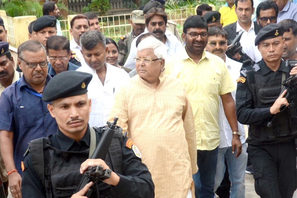 <p>RJD Chief Lalu Prasad Yadav arrives at a special CBI court in connection with multi-crore fodder scam case in Ranchi on Thursday.</p>
