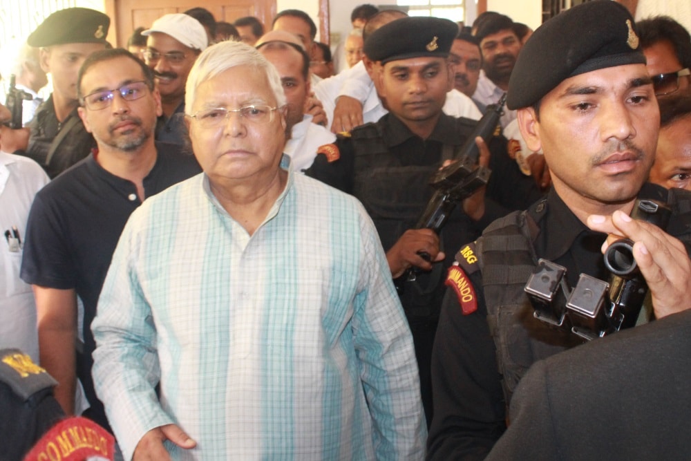 <p>Former Bihar Chief Minister and RJD Supremo Lalu Prasad Yadav arrives at special CBI court in connection with fodder scam cases in Ranchi on Friday.</p>
