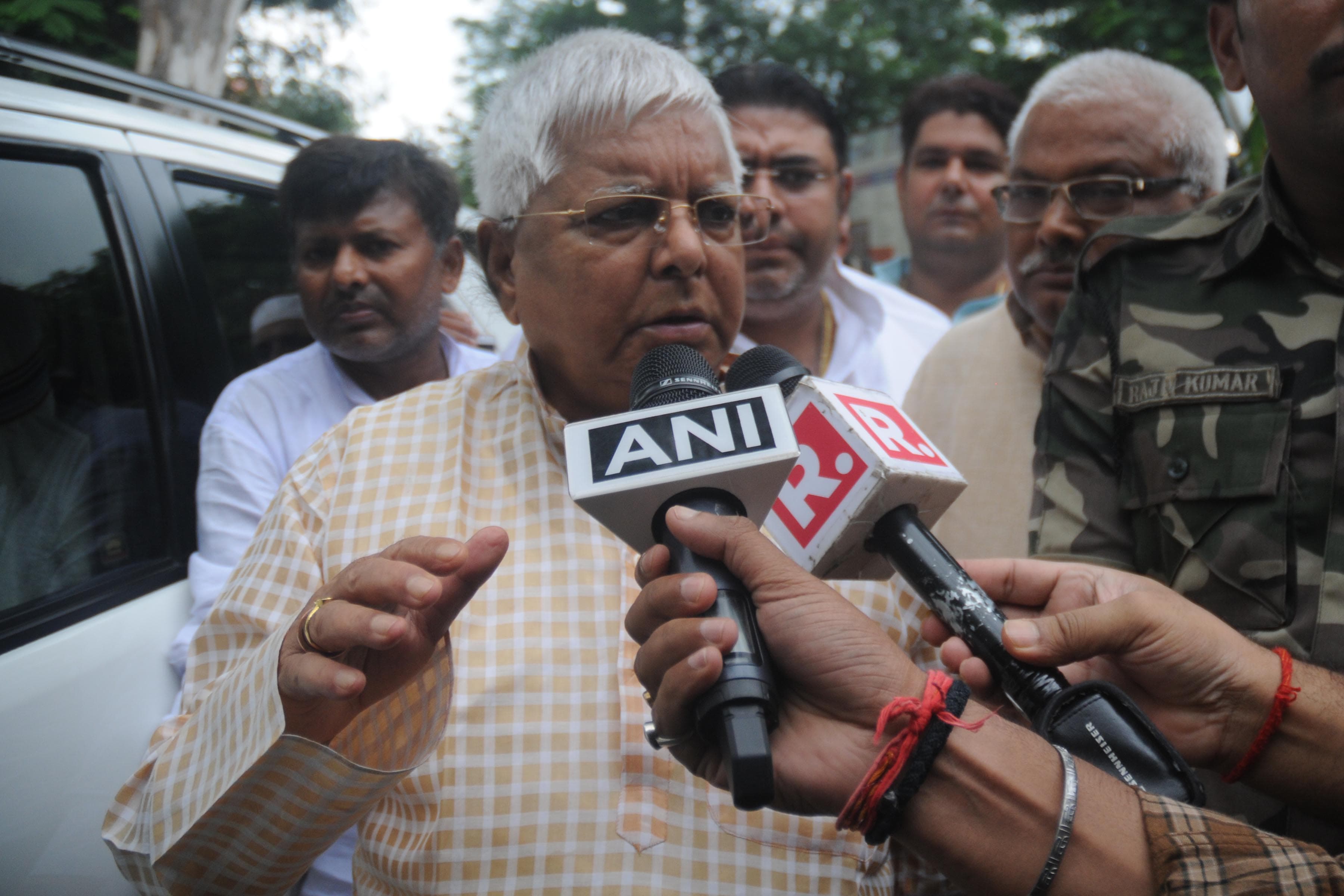 <p>Rashtriya Janta Dal (RJD) leader and former Bihar Chief Minister Lalu Prasad Yadav arrive at Civil court to surrender at the special CBI court in connection with multi-crore fodder…