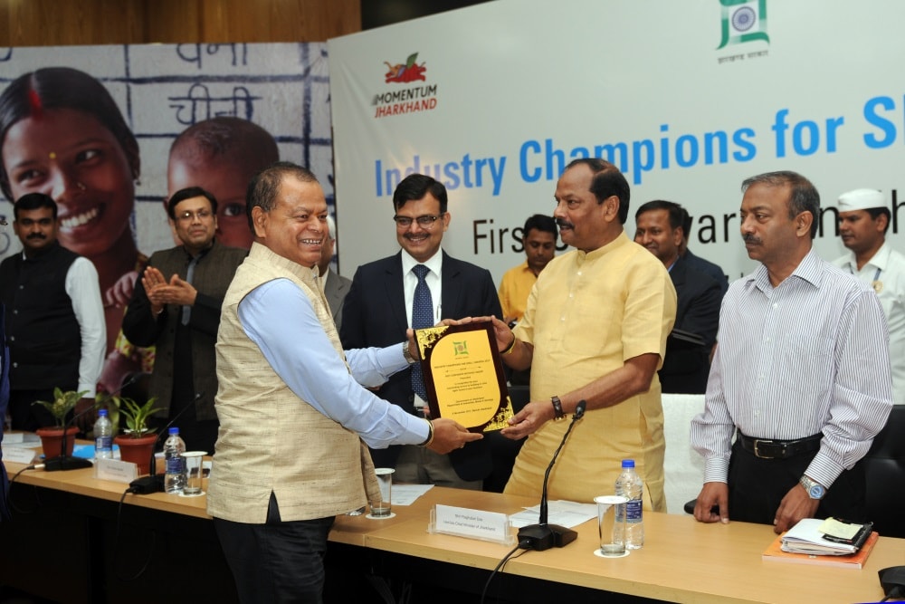 <p>Ex Director of NTPC RK Singh receiving Industry Champions for SDG awards from Chief Minister Raghubar Das during first Corporate Social Responsibility (CSR) award ceremony at Project…