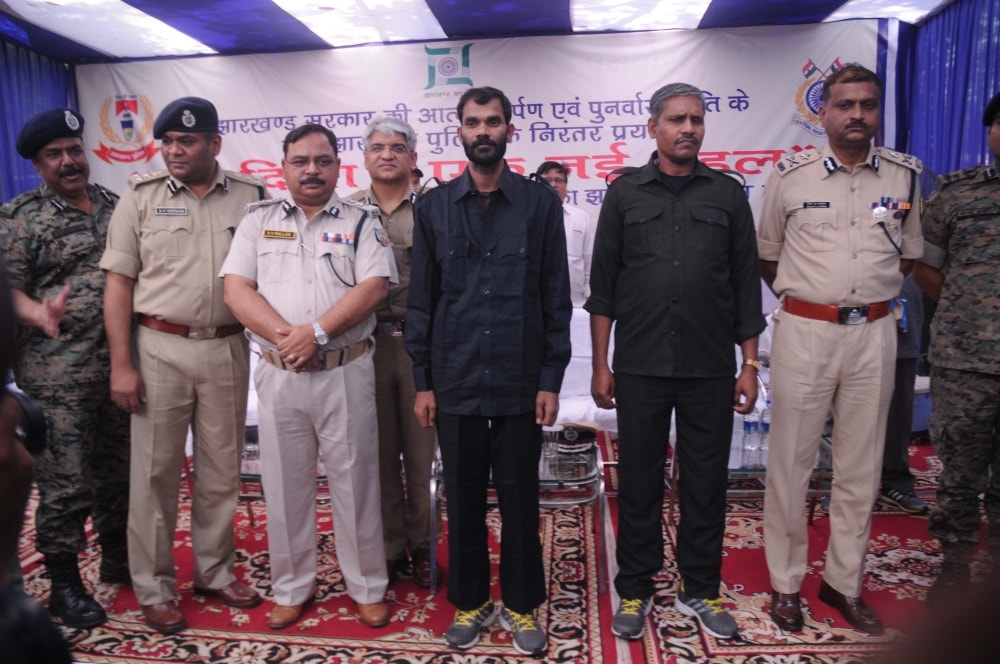 <p>Two hardcore Maoists-Nukul Yadav and Madan Yadav-who were wanted in dozens of criminal cases surrendered before the ADGP RK Mallick inside the Police Headquarter in Ranchi.</p> 
