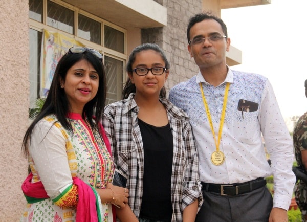<p>Energy Secretary Nitin Madan Kulkarni alongwith his wife Suman Gupta and daughter pose for a photo after receiving degree and medals during 6th convocation of  IIM Ranchi at…
