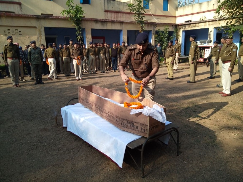 <p>Picture showing Giridih SP,  Akhilesh Verier giving tribute to the police officer who was killed while trying to defuse a bomb in Saria police station on Monday, ASP Deepak…