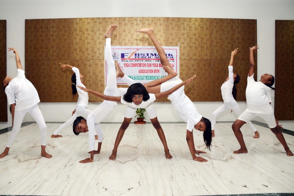 <p>School students performs Yoga during the Yoga Competition cum Yoga workshop in association with Sona Sabran memorial society at First Mart Public school in Ranchi on Monday.</p>…