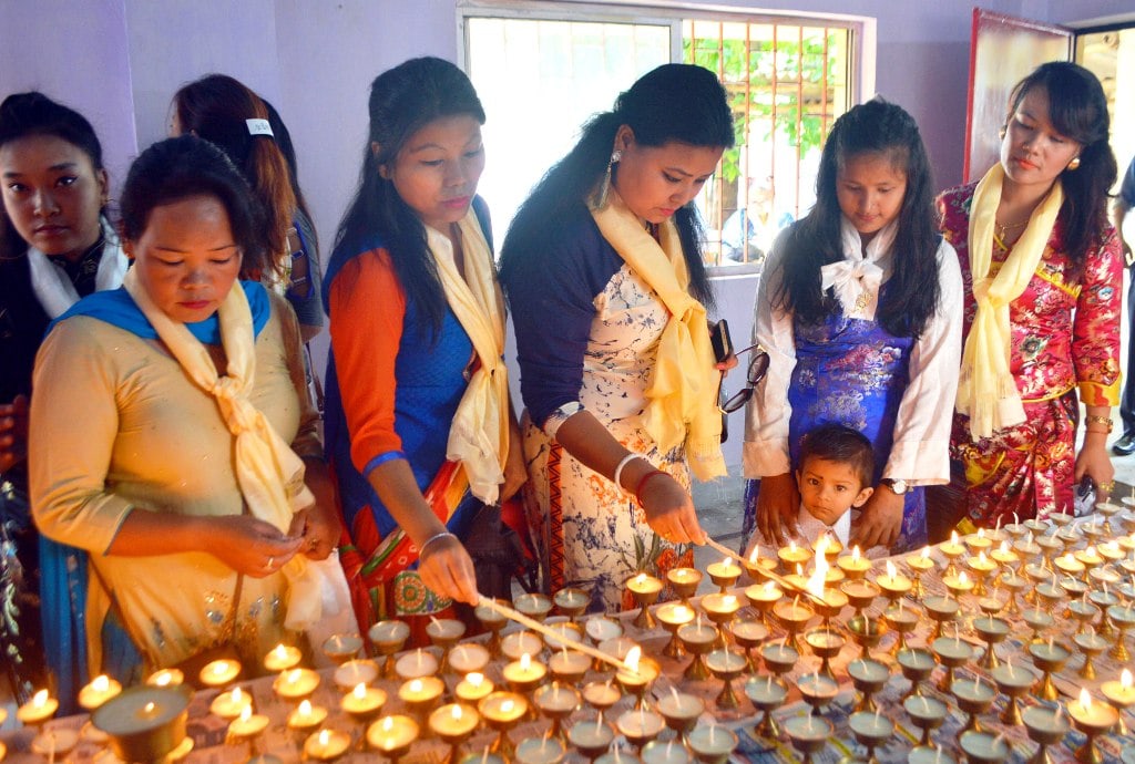 <p>Buddhist devotees light lamps on the occasion of Buddha Purnima at JAP-1 Doranda in Ranchi on Monday. The festival marks the triple events of Gautam Buddha's life- his birth,…