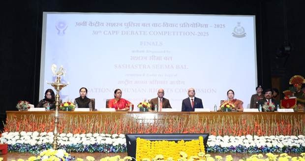 CISF lifts the running trophy as the best team in the NHRC organised 30th debate competition