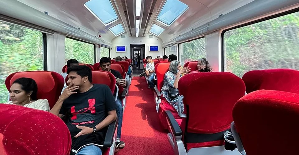Passengers in cheers having got a special Vistadome coach carrying Ranchi- Hazaribagh- Giridih train in Jharkhand 